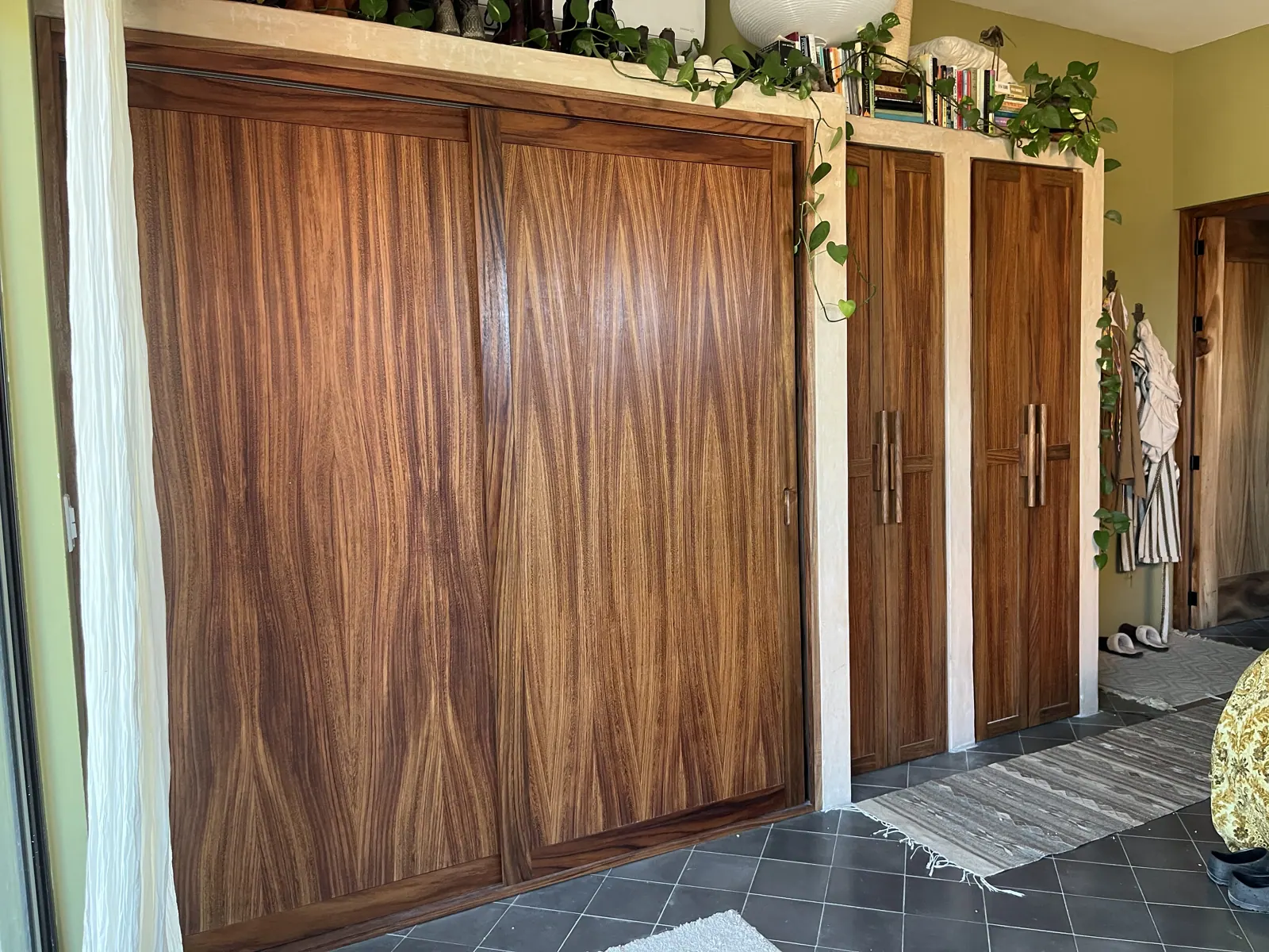 Floor-to-ceiling wood wardrobe doors